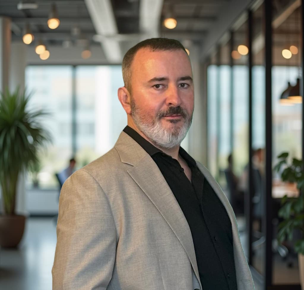 Richard Kolesar, founder and CEO of APEXA, in a modern office setting